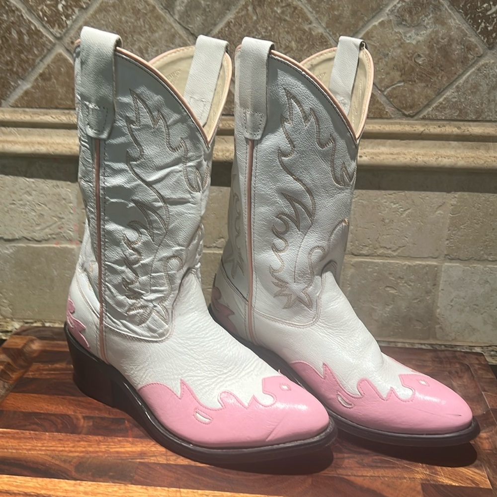 White cowboy boots with pink accents and western detail